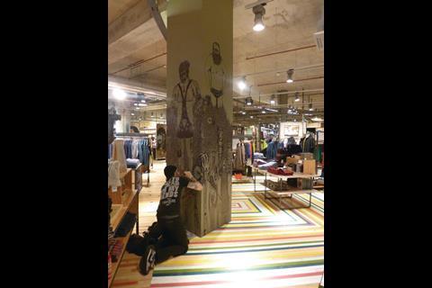 The reclaimed gym floor resembles a Paul Smith pattern